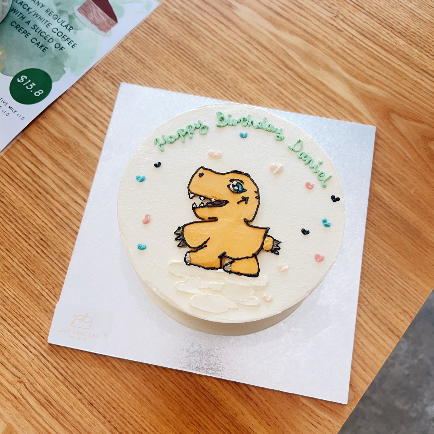 Hand Drawing Little Dinosaur Birthday Cake