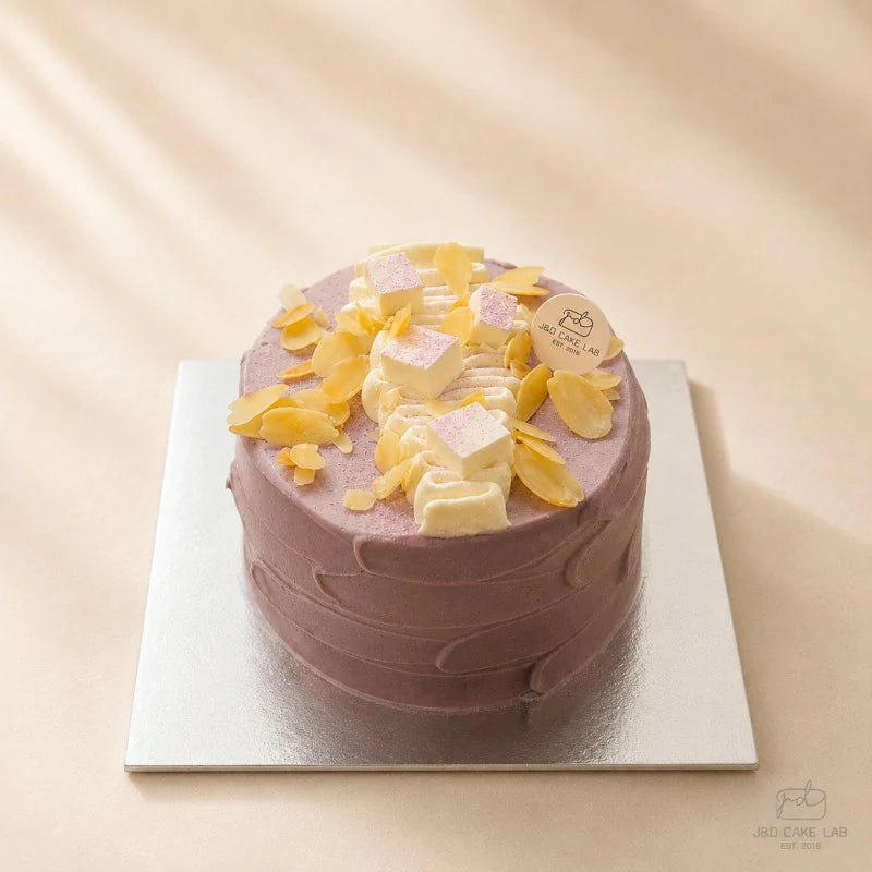 Top view of JD Signature taro cheese lava cake with coconut brûlée cubes