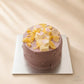 Top view of JD Signature taro cheese lava cake with coconut brûlée cubes