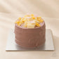 ide view of purple taro cheese lava cake with textured cream finish