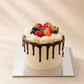 Chocolate strawberry cream cake with a chocolate collar and fresh berries in Adelaide