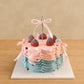 Pastel Ribbon and Ruffles Cake with pink bows, blue cream piping and strawberries in Adelaide