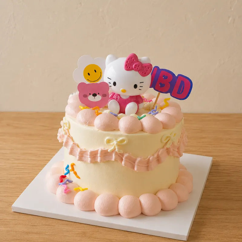 Three-quarter view of Vintage Hello Kitty Birthday Cake with pink cream piping and retro bow details
