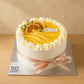 Lemon Yuzu Cream Cake with citrus topping, cream piping and dried citrus slices in Adelaide