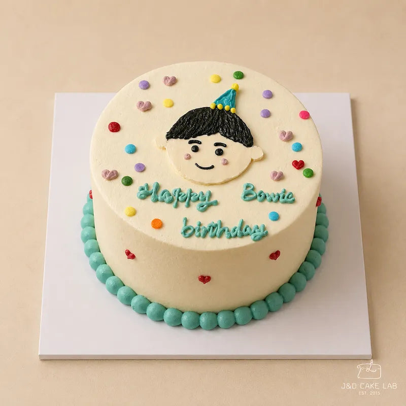 Hand-drawn little boy birthday cake with personalised writing and colourful decorations in Adelaide