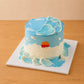 Ocean sunset fresh cream cake with blue and white buttercream waves in Adelaide
