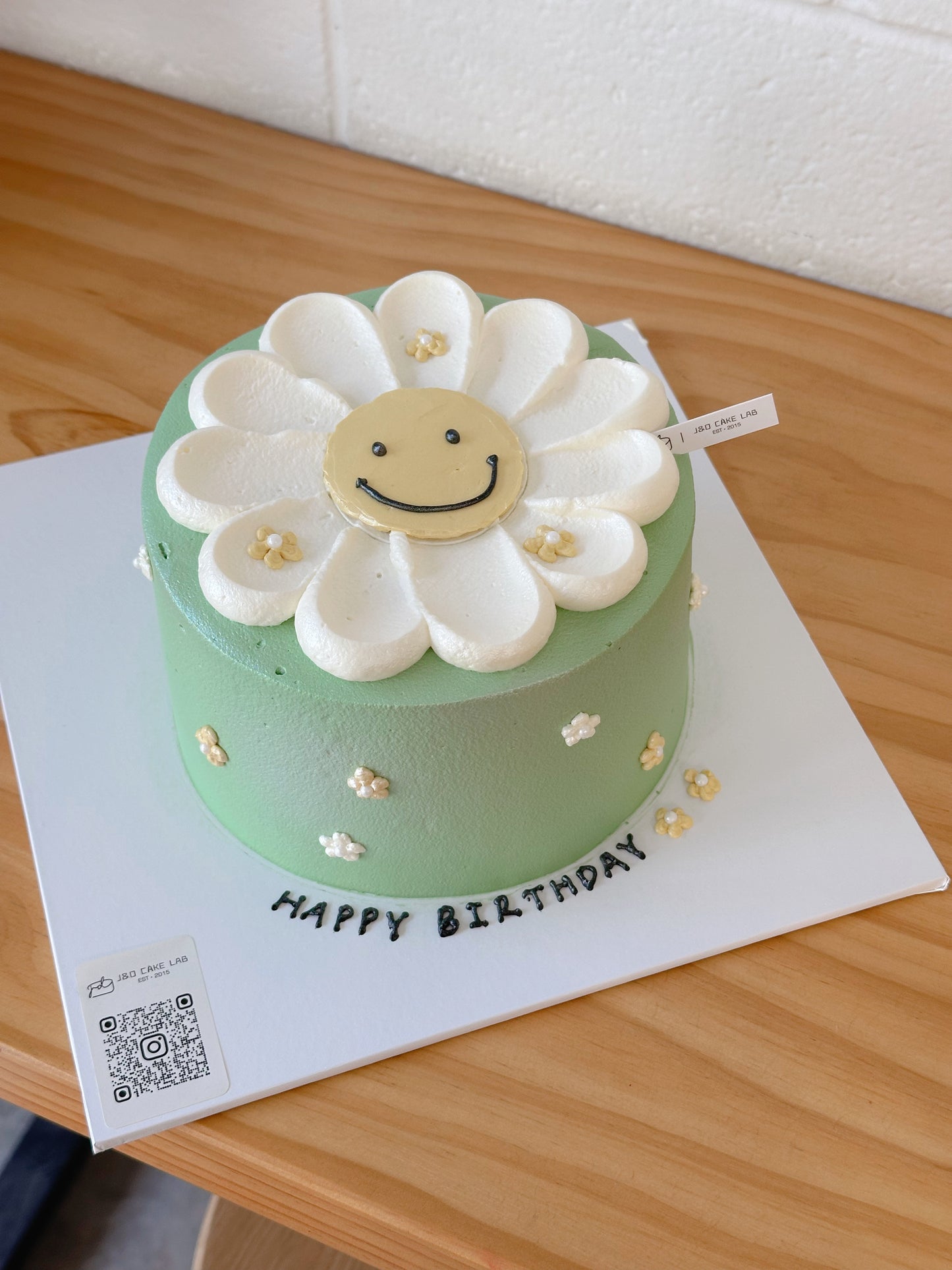 Daisy Smiley Face Cake